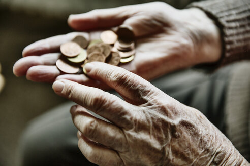 Senior woman's hands with coins - JATF00945