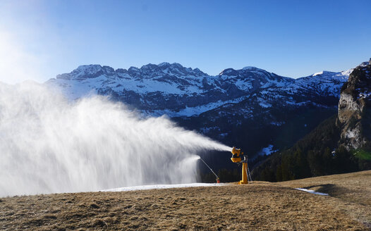 Switzerland, Portes du Soleil, Champery, active snow cannon - FMKF03484