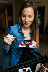 Young woman enjoying a healthy dessert - VABF01062