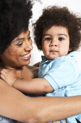 Portrait of little boy with his mother watching him - FSF00697