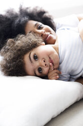 Portrait of little boy with his mother in the background - FSF00718