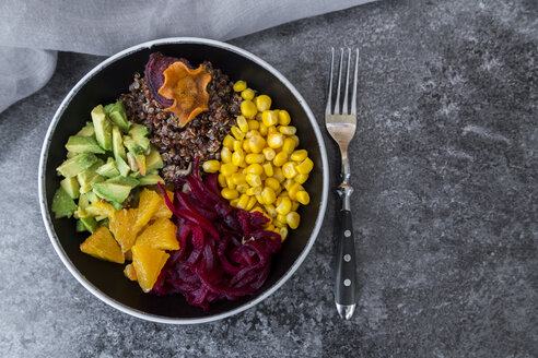 Lunch bowl of red quinoa, beetroot, corn, avocado, orange and vegetable chips - SARF03147