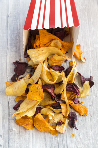 Vegetable chips with pyramide salt stock photo