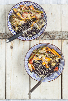 Vegan Buddha bowl of black rice, roasted vegetables, Tahini sauce and sesame seeds - SBDF03138