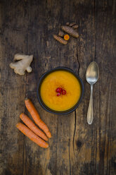 Bowl of carrot curcuma soup with ginger and chili - LVF05848
