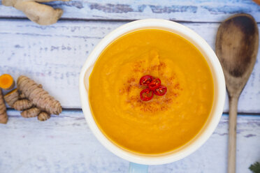 Bowl of carrot curcuma soup with ginger and chili - LVF05852