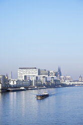 Germany, Cologne, Crane Houses at River Rhine and Cologne Cathedral in the background - HLF01003