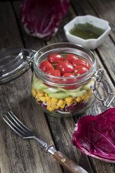 Preserving jar of salad with different vegetables - YFF00634