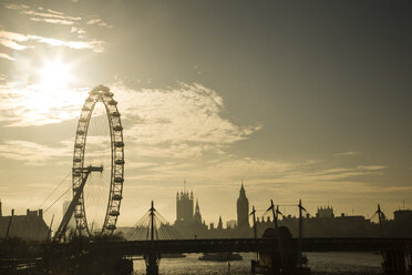 UK, London, skyline with London Eye and Big Ben in backlight - NGF00379