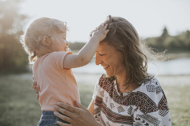 Mother and little daughter relaxing in nature - DWF00275