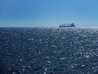 Italy, Sicily, cargo ship on the ocean - EJWF00840