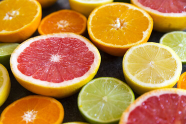 Sliced citrus fruits, close-up - SARF03178