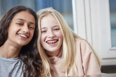 Portrait of two happy girls side by side - RHF01825