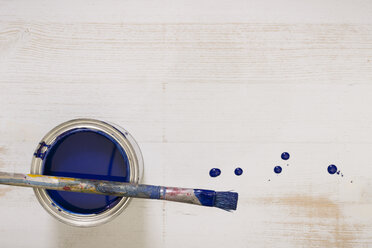 Used paint brush on paint tin with blue varnish - CMF00641