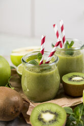 Glasses of green smoothie and ingredients - JUNF00863