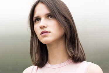 Portrait of young woman watching something - LMF00648