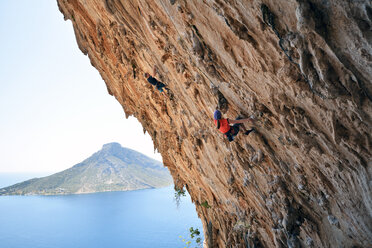 Greece, Kalymnos, two climbers in rock wall - LMF00674