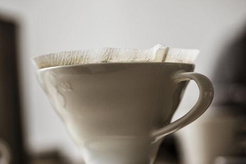 Used porcelain coffee filter stock photo