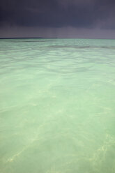 Caribbean, Dominican Republic, Saona Island, dark clouds over the sea - DSGF01471