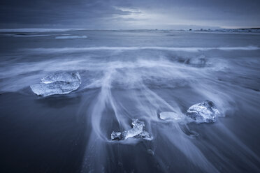 Iceland, Jokulsarlon, glacial ice on the beach at blue hour - EPF00360