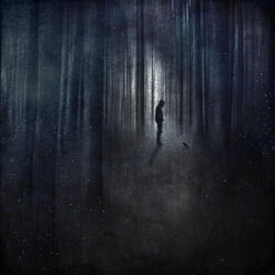Germany, Birgelen, man with raven in forest, surreal manipulation - DWIF00831