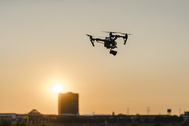 Drone in the sky at sunset - KNSF01128