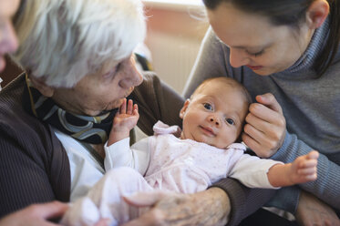 Old woman meeting her great granddaughter - DIGF01530