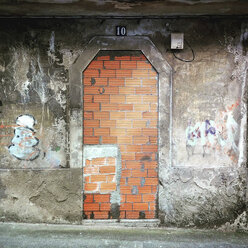 Abandoned door in the street, Ferrol, Galicia, Spain. - RAEF01760