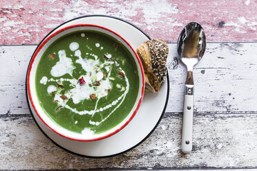 Bowl of spinach soup with chilipods and almonds - SARF03212