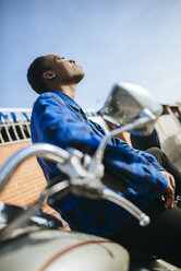 Young woman on motorbike - KIJF01298