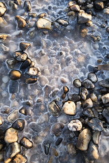 Frozen lake with stones - NDF00630