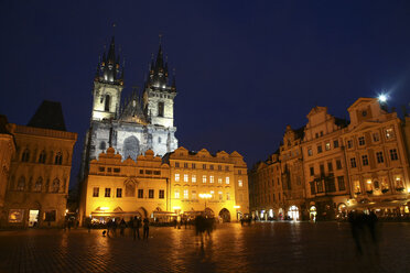 Czechia, Prague, Old Town Square and illuminated Church of Our Lady Before Tyn at dusk - DSGF01506