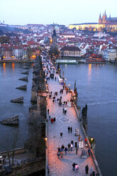 Czechia, Prague, cityscape with Charles Bridge at dusk seen from above - DSGF01515