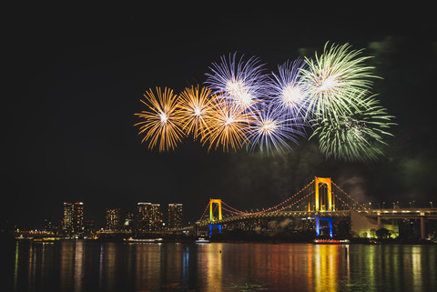 Japan, Tokyo, Odaiba, fireworks above the Rainbow Bridge stock photo