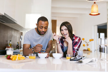 Young couple having breakfast in the kitchen - VABF01221