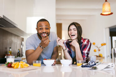 Young couple having breakfast in the kitchen - VABF01222