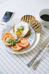 Breakfast wth eggs, avocados, coffe and tomatoes - GIOF02164