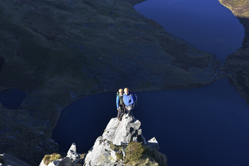 UK, North Wales, Snowdonia, Craig Cwm Silyn, two mountaineers on Outside Edge Route - ALRF00846