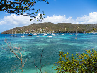Caribbean, St. Vincent And The Grenadines, Bequia, bay of Port Elisabeth with sailing ships - AMF05341
