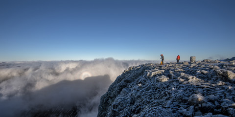 UK, Scotland, Ben Nevis, mountaineers on summit stock photo