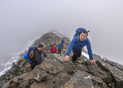UK, Scotland, Glencoe, mountaineers at Stob Coire Nan Lochan stock photo
