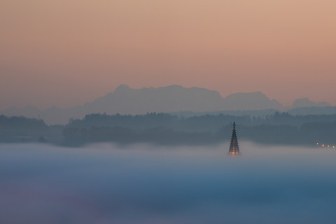 Germany, Constance, spire of Constance minster emerging from sea of fog stock photo