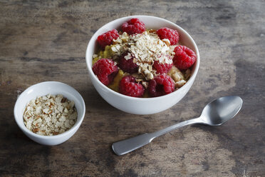 Bowl of porridge with raspberries - EVGF03131