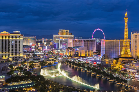 USA, Nevada, Las Vegas, Strip, fountain, hotels and Eiffel Tower at blue hour stock photo