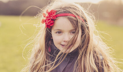 Portrait of little girl wearing hair band - NMSF00025