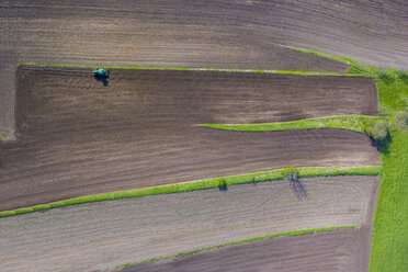 Tractor on field, aerial view - MMAF00062