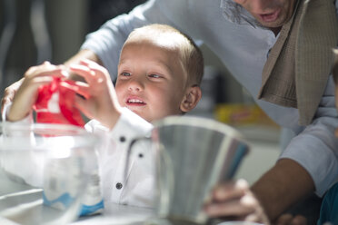 Father and son in kitchen - ZEF13217