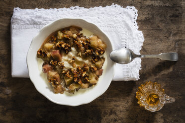 Schüssel Porridge mit Rhabarberkompott, Honig und Nüssen - EVGF03160