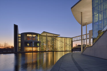 Germany, Berlin, Paul Loebe Government Building at Spree river in the evening - RUEF01773