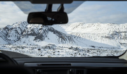 Iceland, snow-capped mountain seen from inside car - EPF00415